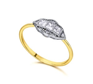 Anillo art decó con forma rombo en oro amarillo y diamantes de alta calidad.